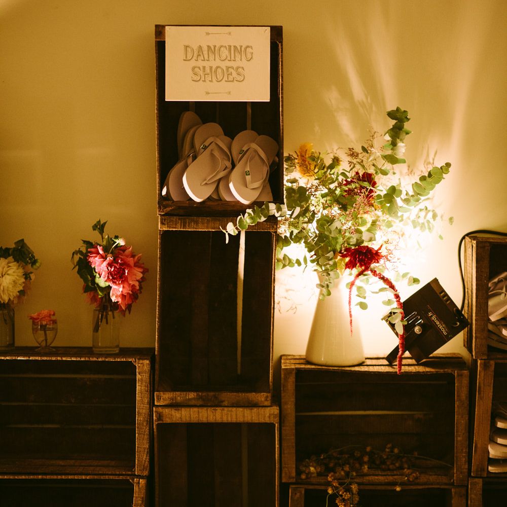 Flip Flop Dancing Shoes in Wooden Crates Wedding Decor | Stylish Two Day Wedding at Château de Varennes, Burgundy, France with I Do BBQ After Party Planned by Bulle &amp; Tulle | Troistudios Photography | Studio80  Film