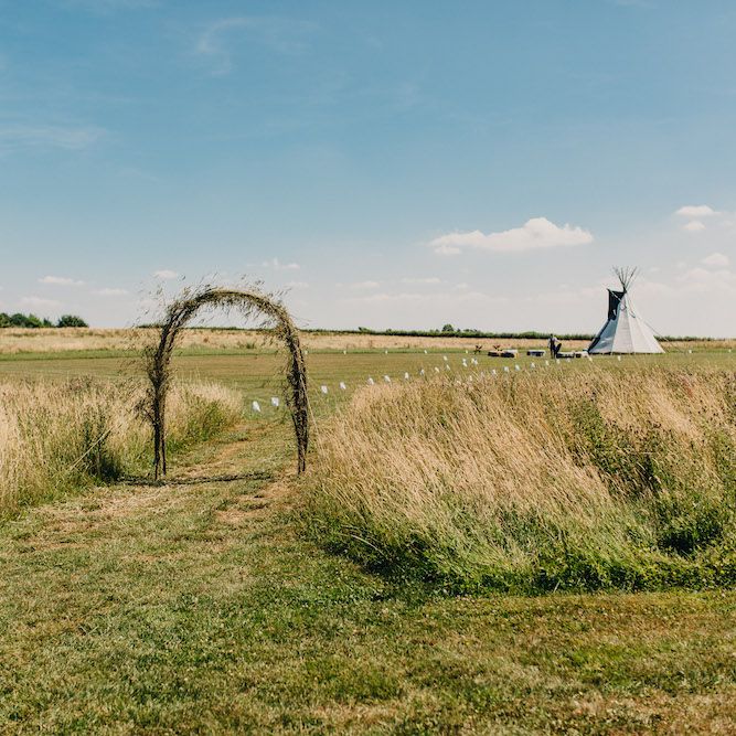 Bell Tent at Old Summer Dairy | Colourful Bunting Wedding Decor for a Festival Themed Marquee Wedding | Peppermint Love Photography