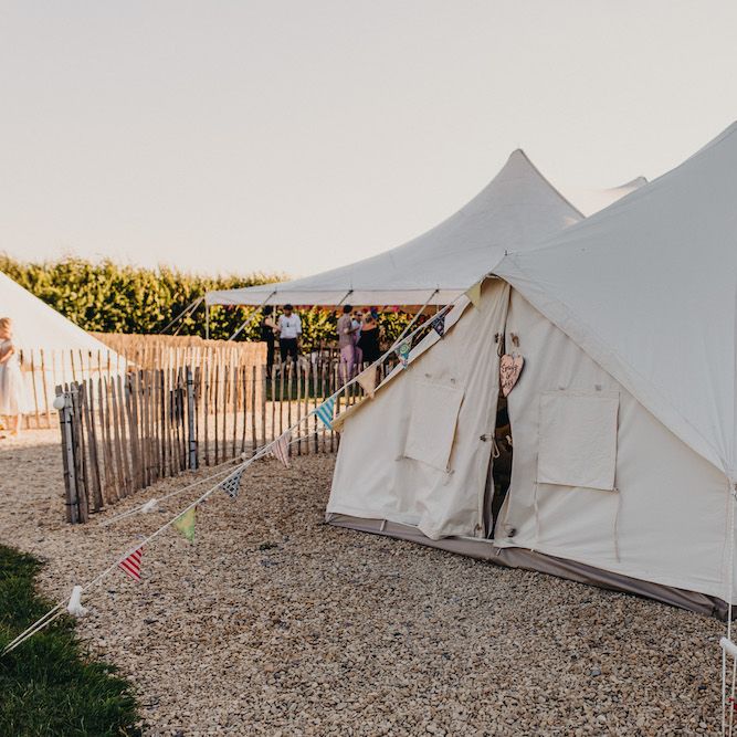 Bell Tent at Old Summer Dairy | Colourful Bunting Wedding Decor for a Festival Themed Marquee Wedding | Peppermint Love Photography