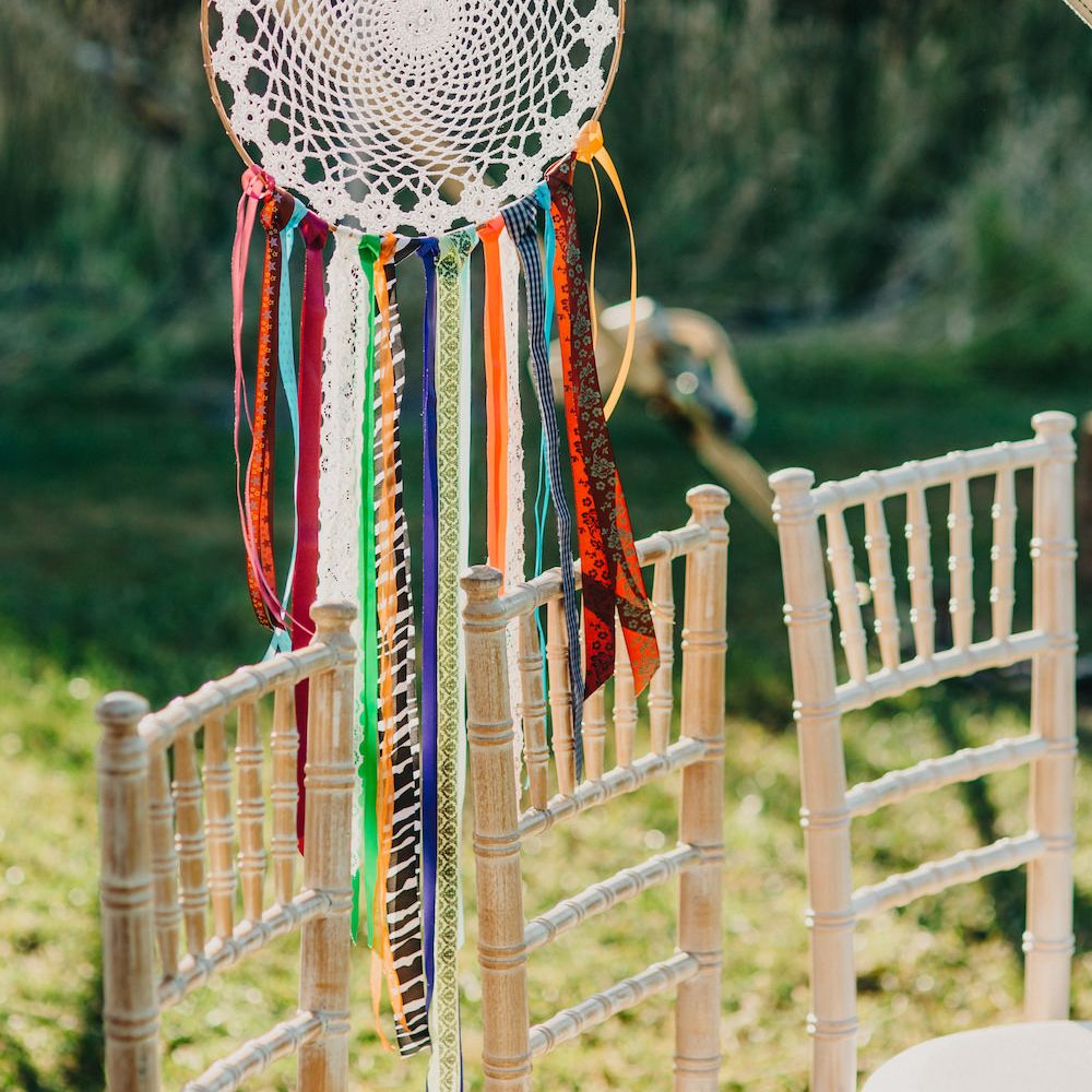 Dreamcatcher with Colourful Hanging Ribbons | Colourful Bunting Wedding Decor for a Festival Themed Marquee Wedding | Peppermint Love Photography