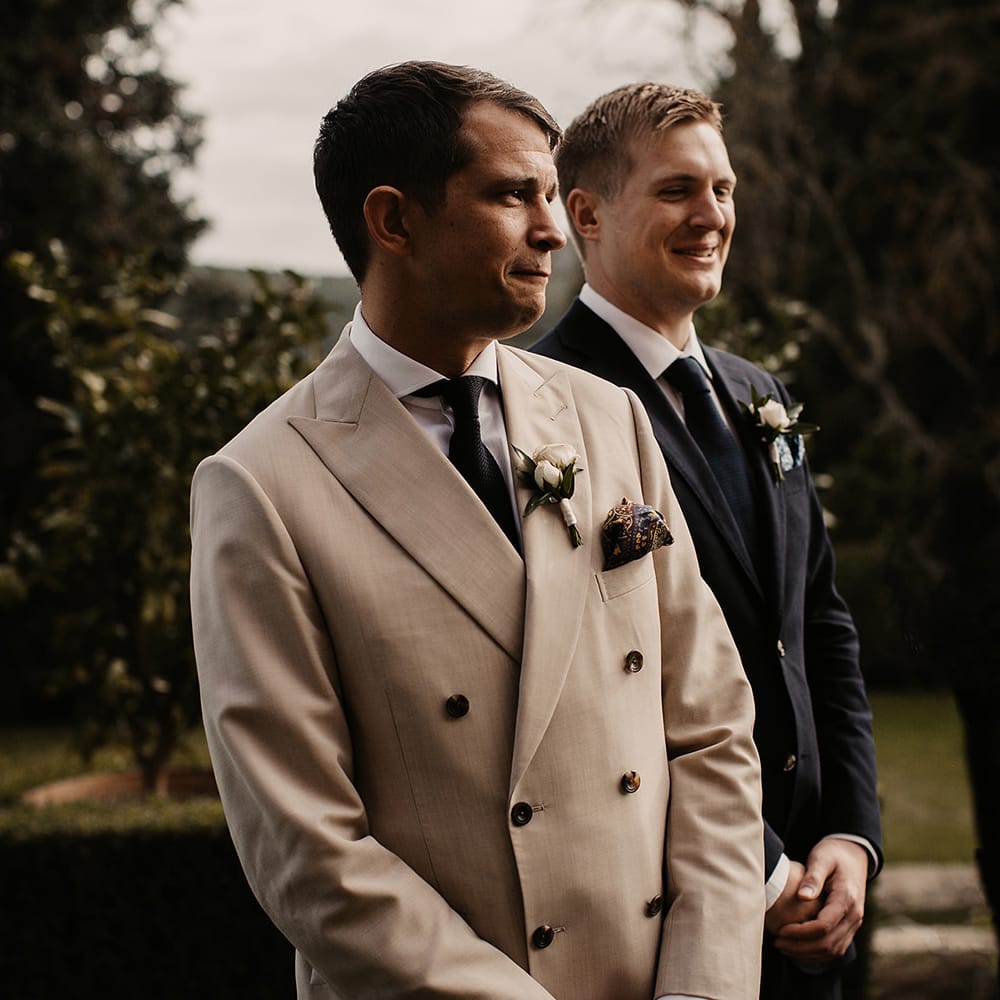Groom in cream dinner jacket for Italian wedding