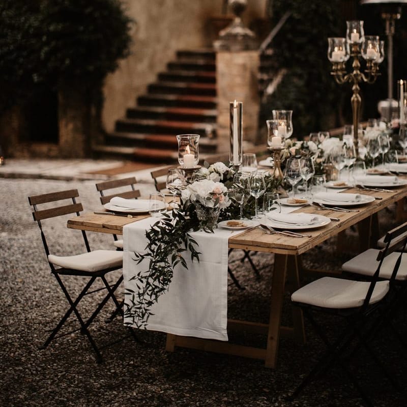 White wedding flower table decor with candelabras