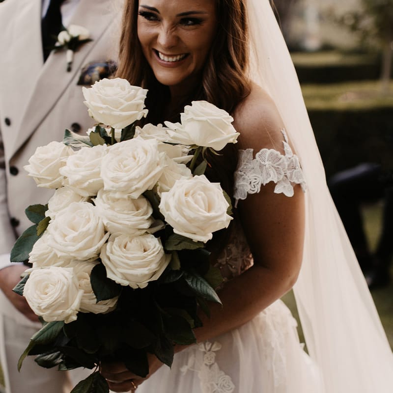 White rose wedding bouquet with Galia Lahav bride dress