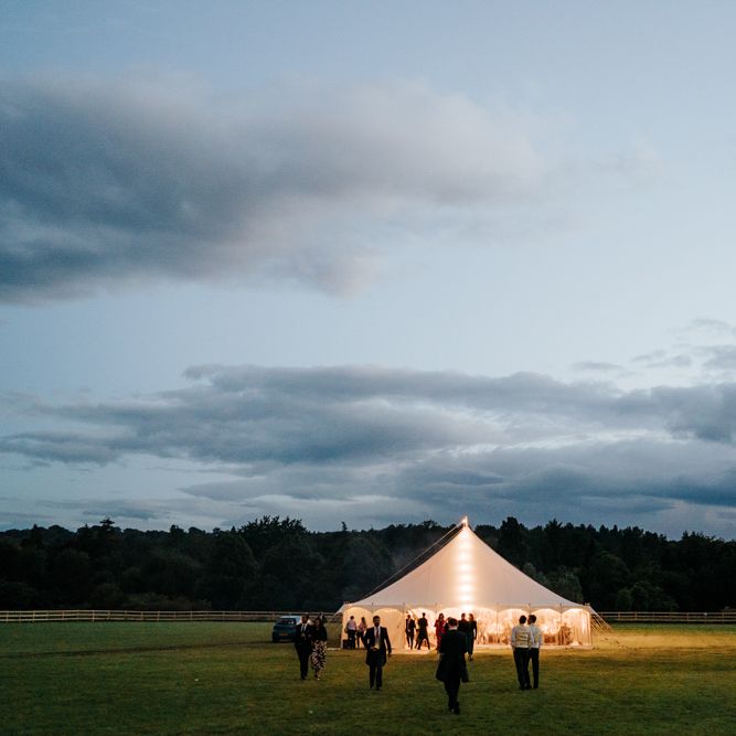 Marquee during dusk as the moon illuminates the sky at Hawarden Castle in Wales