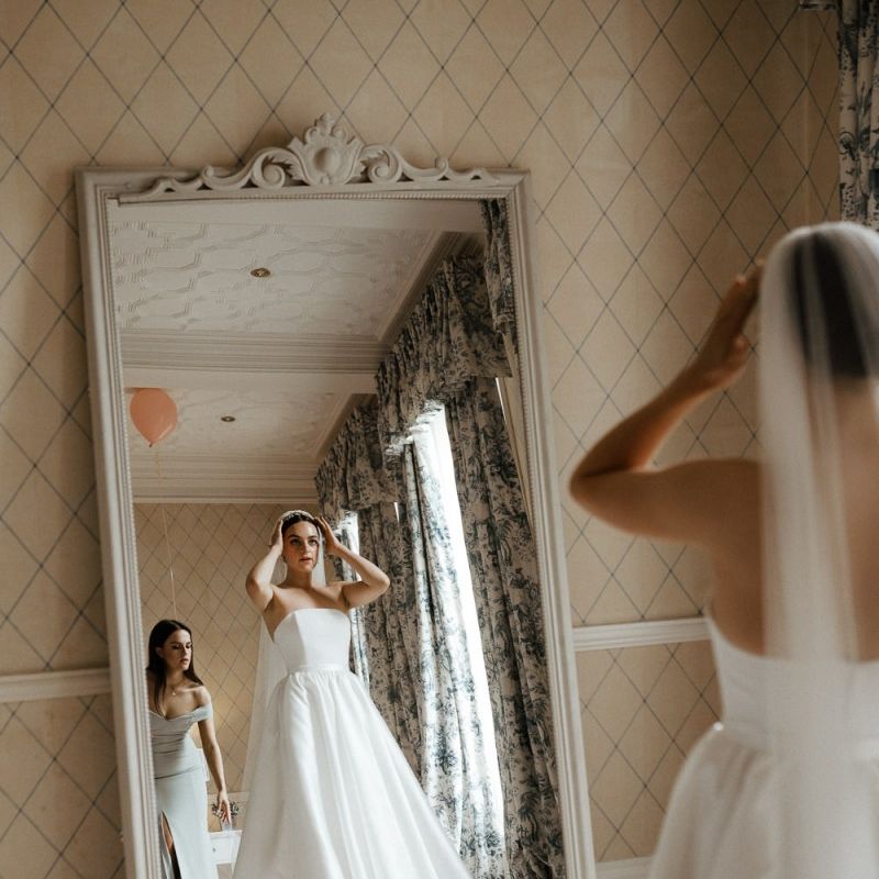 Bride In Strapless Wedding Dress From Halfpenny London