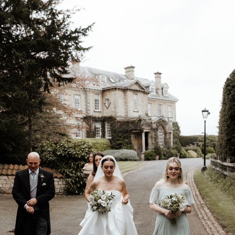 Bridal Party Make Their Way To The Church Ceremony