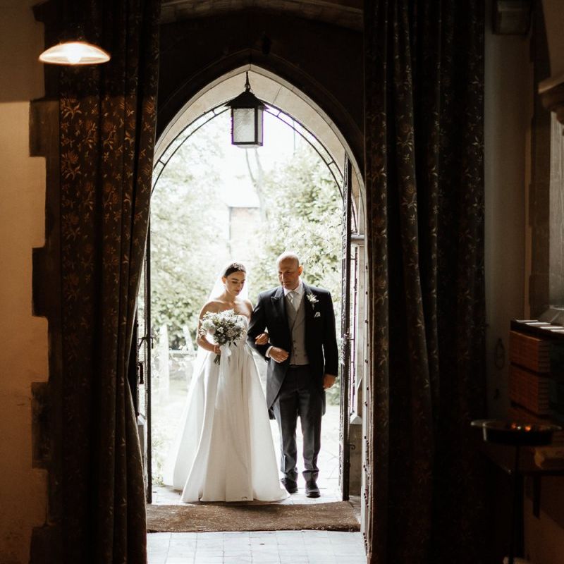 Bride And Father Make Their Way Into Ceremony