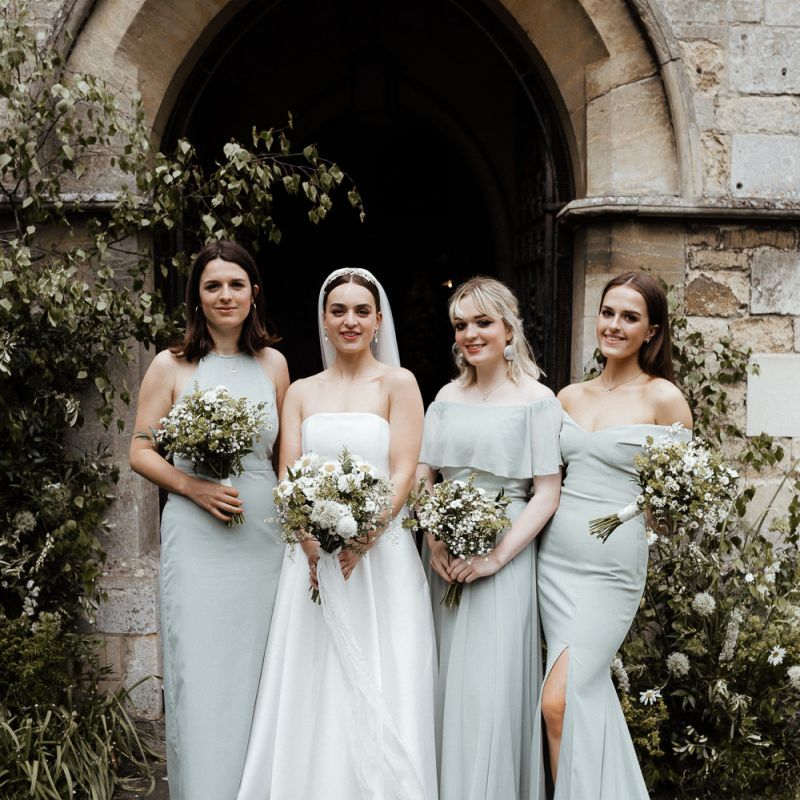 Bride in Strapless Halfpenny London Wedding Dress And Blues Green Bridesmaid Dresses