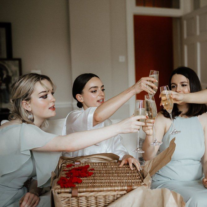 Bridesmaids Getting Ready And Toasting The Day