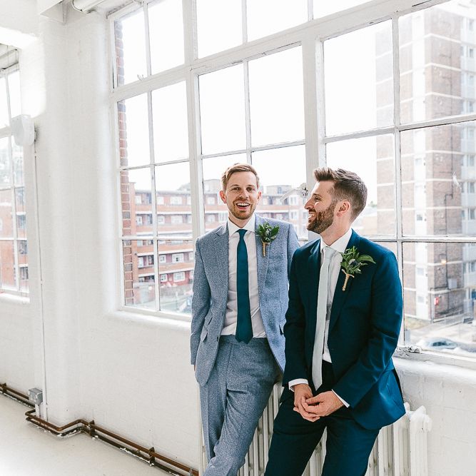 Groom in Dark Petrol Blue Suit by Paul Smith | Groom in Light Blue Made To Measure Suit by Beggars Run | Huge Warehouse Windows | Same Sex Wedding with Industrial Styling at Wimborne House | Marmelo Photography