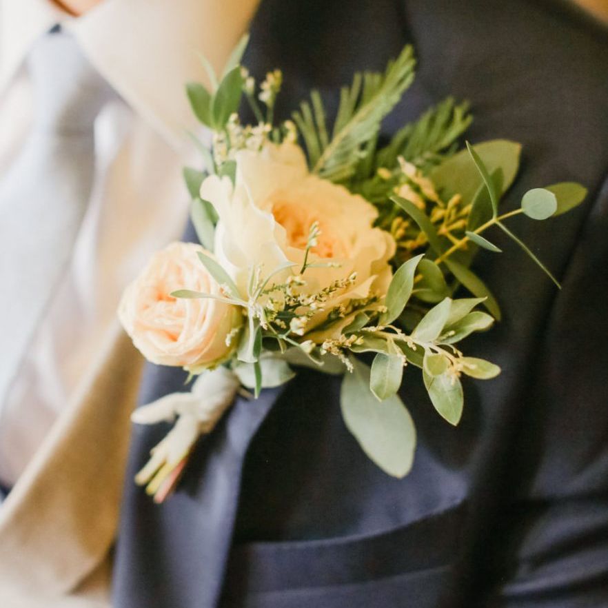 Large pink rose buttonhole fro groom