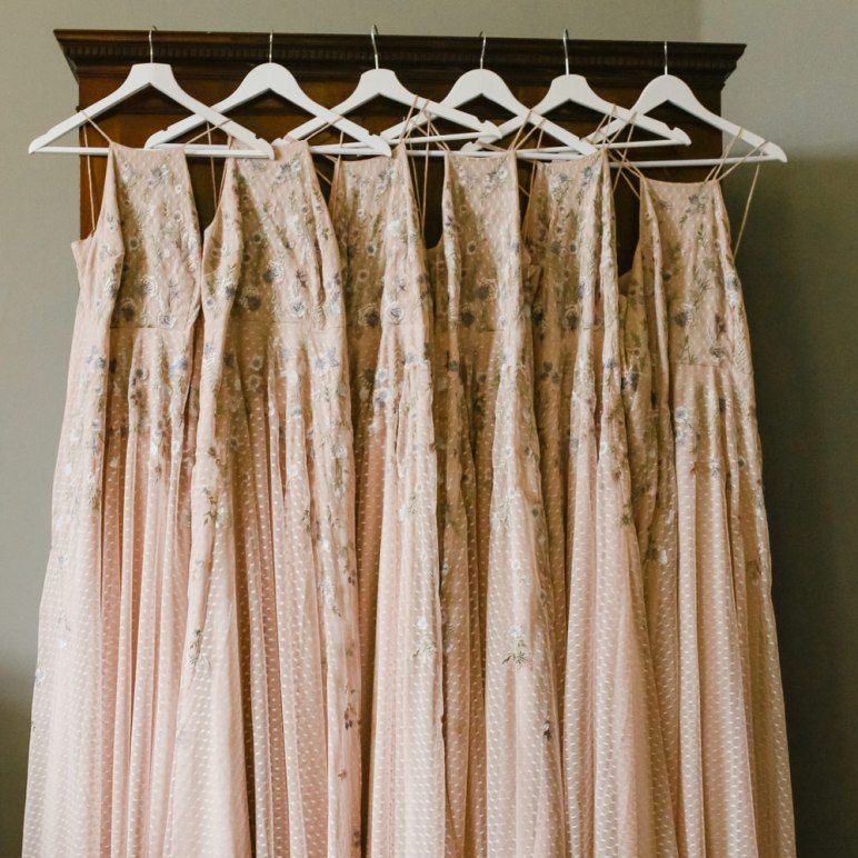 Pink bridesmaids dresses with embroidery detail
