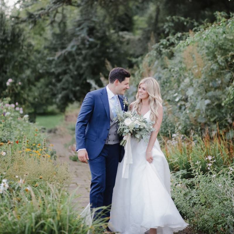Bride and groom portrait in the gardens at Askham Hall