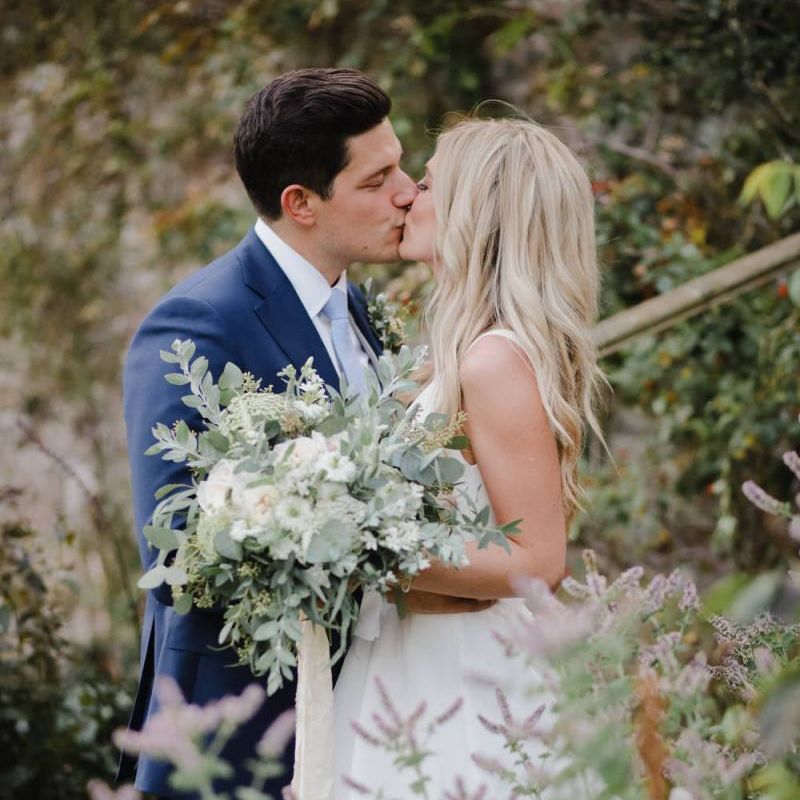 White bridal bouquet with foliage for Askham Hall wedding