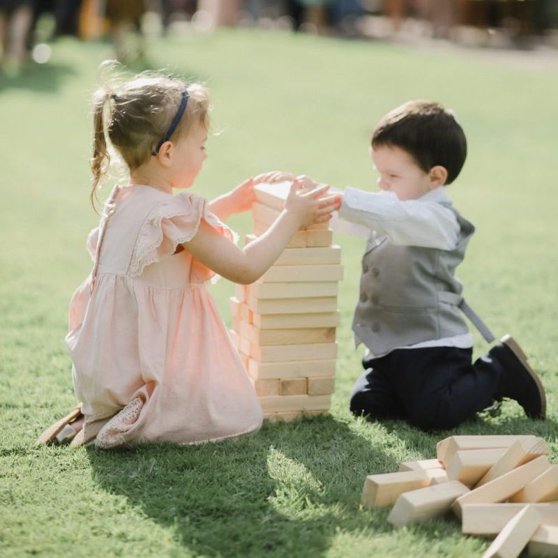 small wedding guests playing garden games
