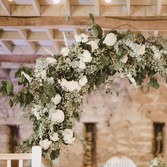 White and green flower arch
