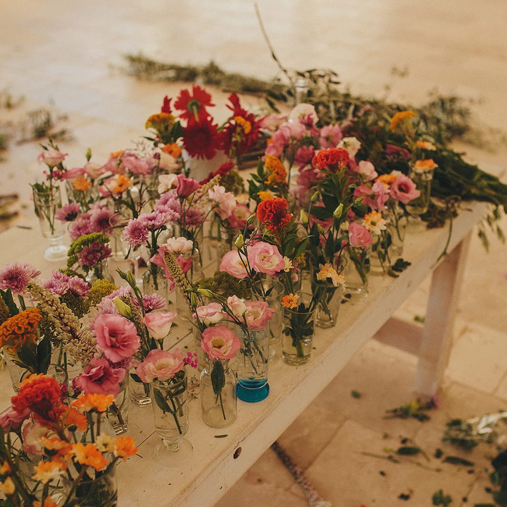Wedding Flower Stems in Vases | Brightly Coloured Destination Wedding at Masseria Potenti Wedding Venue, Puglia, South Italy | Petar Jurica Photography | Marco Odorino Film