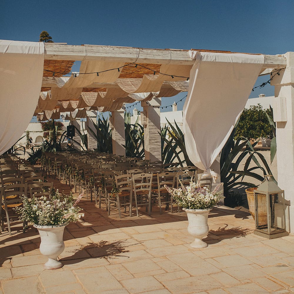 Outdoor Aisle &amp; Altar Style | Brightly Coloured Destination Wedding at Masseria Potenti Wedding Venue, Puglia, South Italy | Petar Jurica Photography | Marco Odorino Film