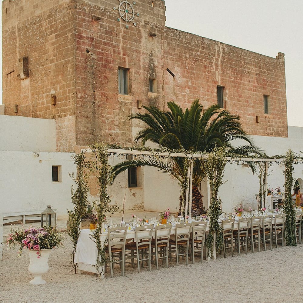 Outdoor Wedding Reception with Vines | Brightly Coloured Destination Wedding at Masseria Potenti Wedding Venue, Puglia, South Italy | Petar Jurica Photography | Marco Odorino Film