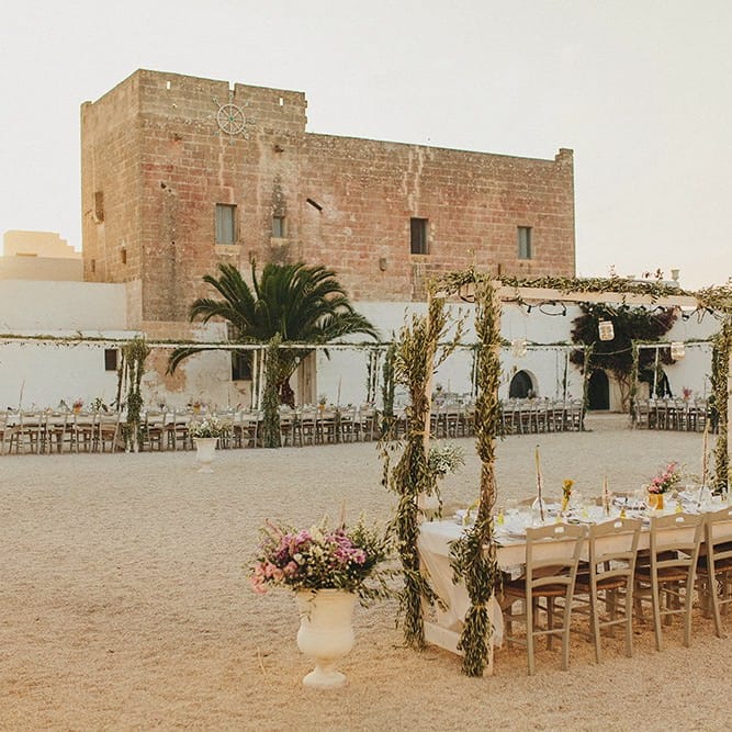 Outdoor Wedding Reception with Vines | Brightly Coloured Destination Wedding at Masseria Potenti Wedding Venue, Puglia, South Italy | Petar Jurica Photography | Marco Odorino Film
