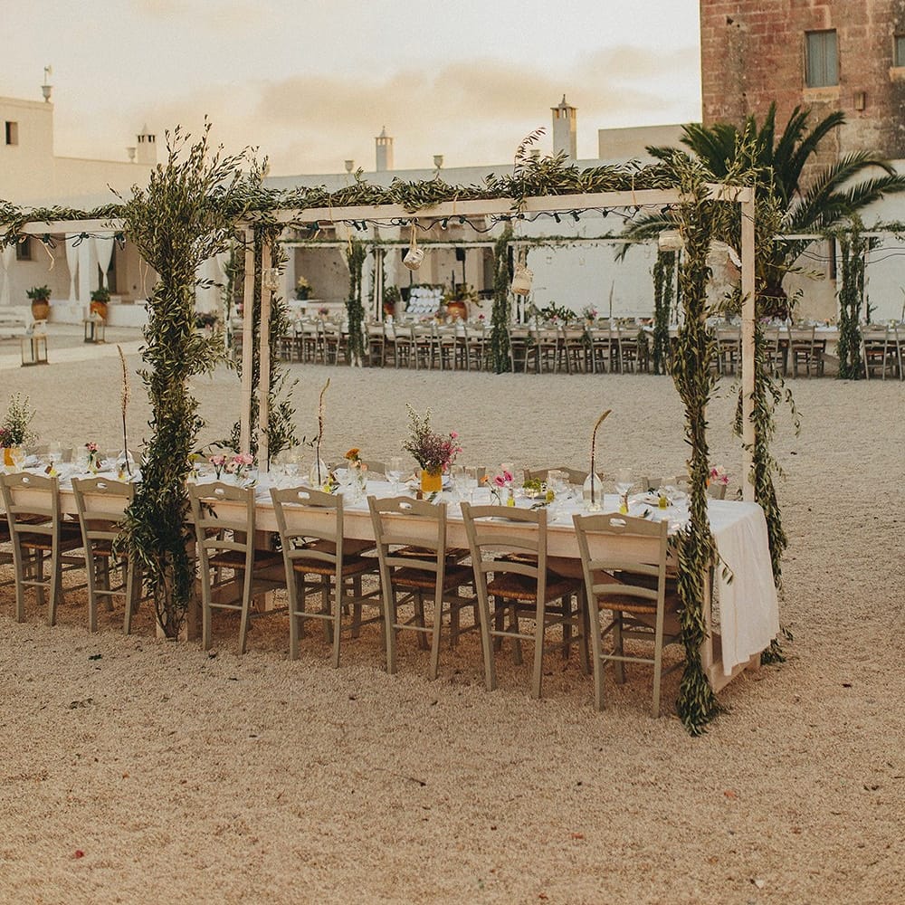 Outdoor Wedding Reception with Vines | Brightly Coloured Destination Wedding at Masseria Potenti Wedding Venue, Puglia, South Italy | Petar Jurica Photography | Marco Odorino Film