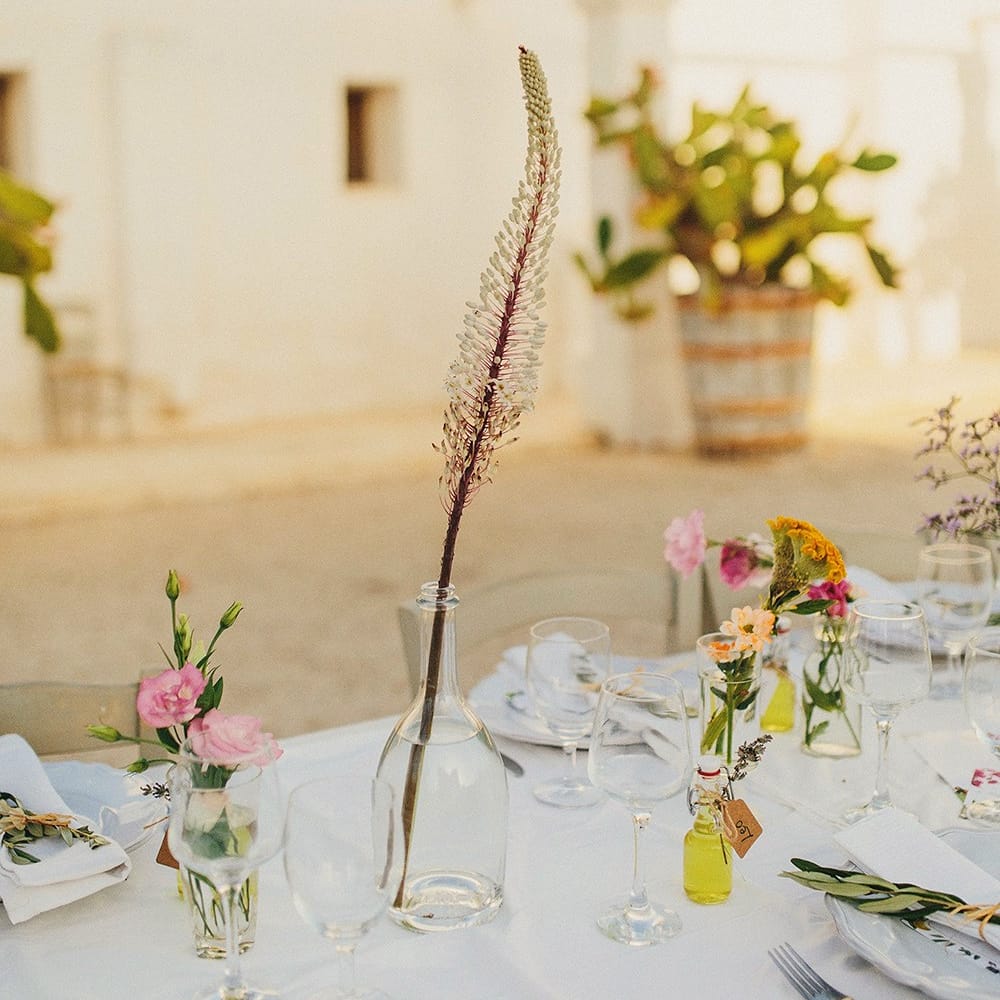 Wild Flower Stems in Vases | Wedding Decor | Brightly Coloured Destination Wedding at Masseria Potenti Wedding Venue, Puglia, South Italy | Petar Jurica Photography | Marco Odorino Film