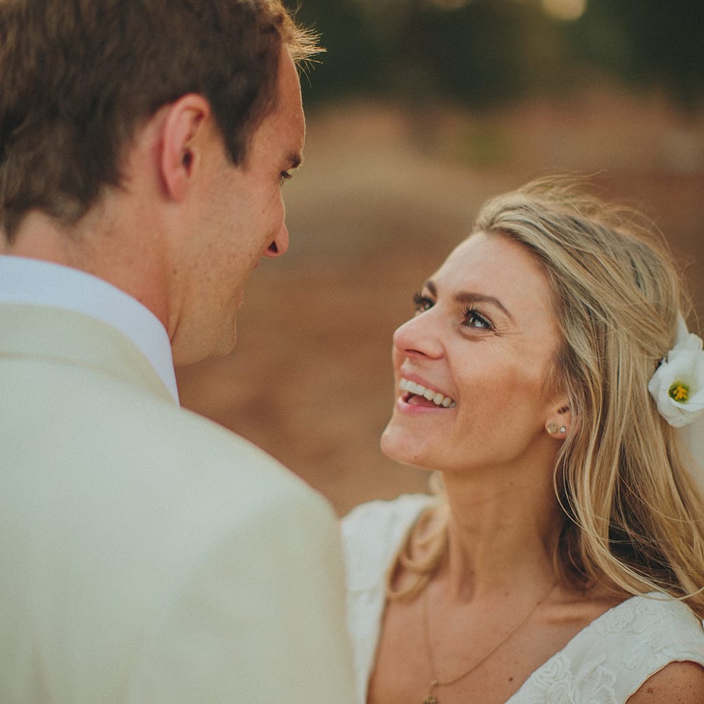 Bride in Custom Clemence Halfpenny London Bridal Gown | Groom in Cream Three Piece Suit | Brightly Coloured Destination Wedding at Masseria Potenti Wedding Venue, Puglia, South Italy | Petar Jurica Photography | Marco Odorino Film