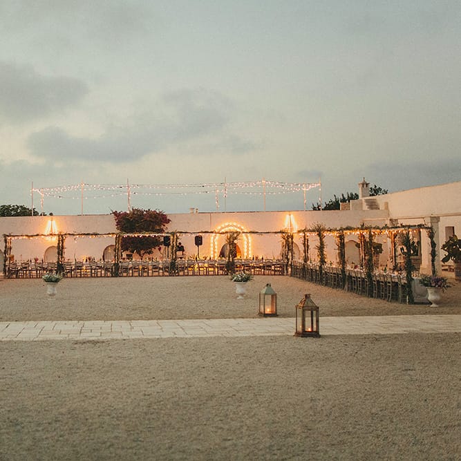 Outdoor Wedding Reception with Vines | Brightly Coloured Destination Wedding at Masseria Potenti Wedding Venue, Puglia, South Italy | Petar Jurica Photography | Marco Odorino Film
