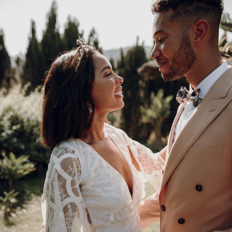 Intimate wedding portrait with bride in Grace Loves Lace dress