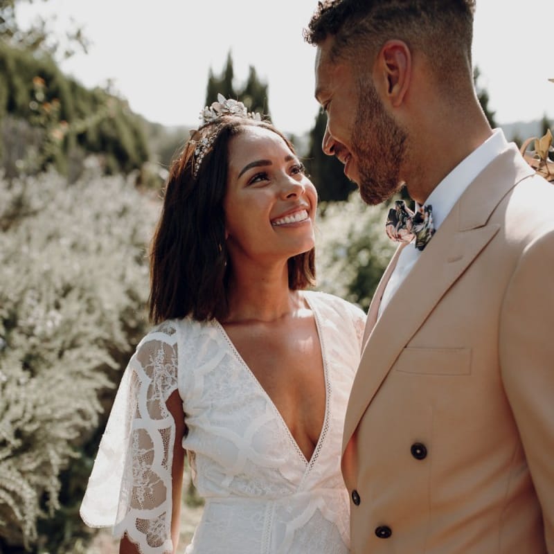 Boho bride in Grace Loves Lace dress and Tilly Thomas Lux Crown  smiling at her groom