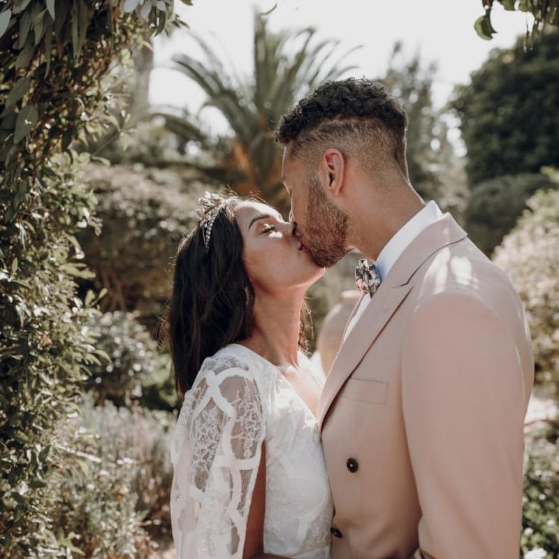 Bride and groom kissing at Spanish destination wedding