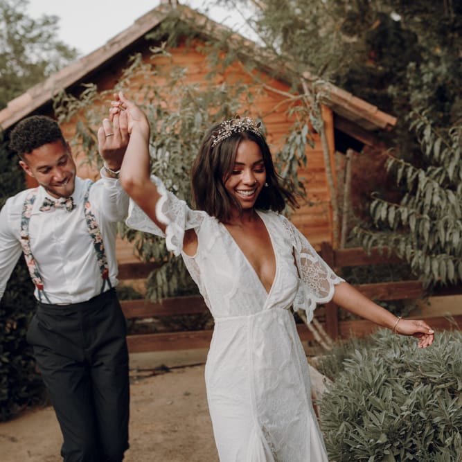 Boho bride and groom dancing