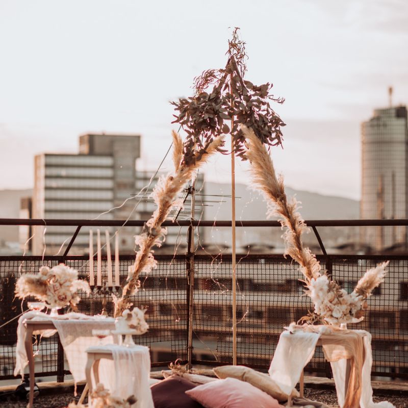 Boho rooftop wedding with naked tipi structure