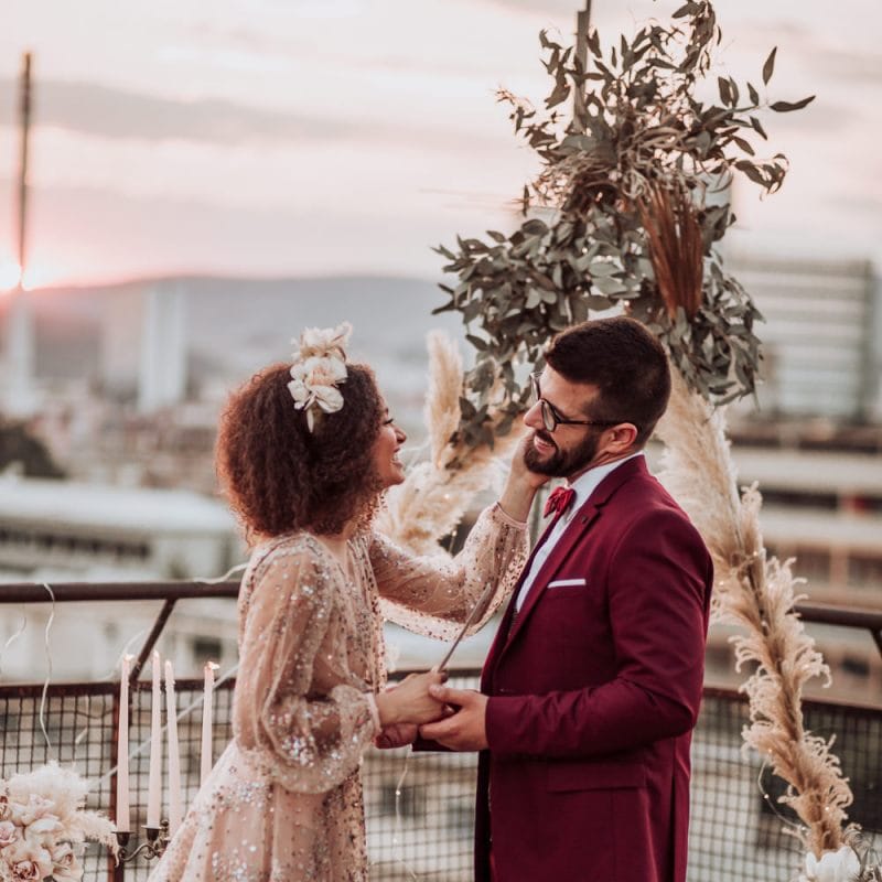 Tender wedding day moment at intimate boho wedding