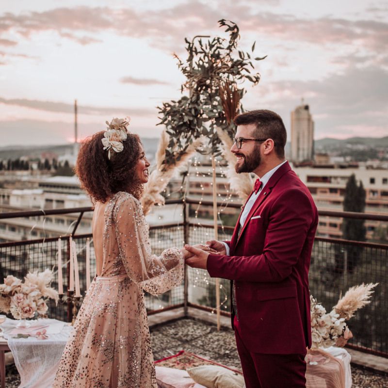 Bride and groom exchanging wedding rings