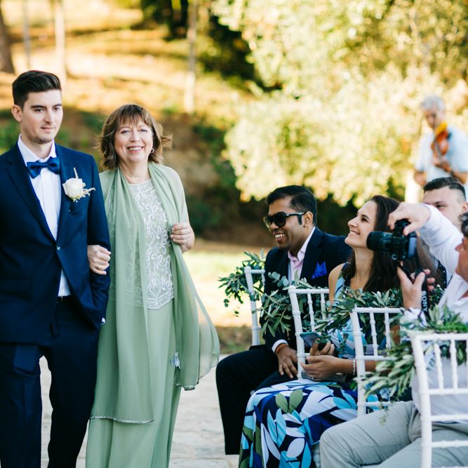 Outdoor Wedding Ceremony | Groom in Black Tie Suit | Pastel Blue &amp; Green, Romantic, Destination Wedding at Corfu Luxury Villas, Planned by Rosmarin Weddings &amp; Events | Mikhail Balygin Fine Art Wedding Photographer