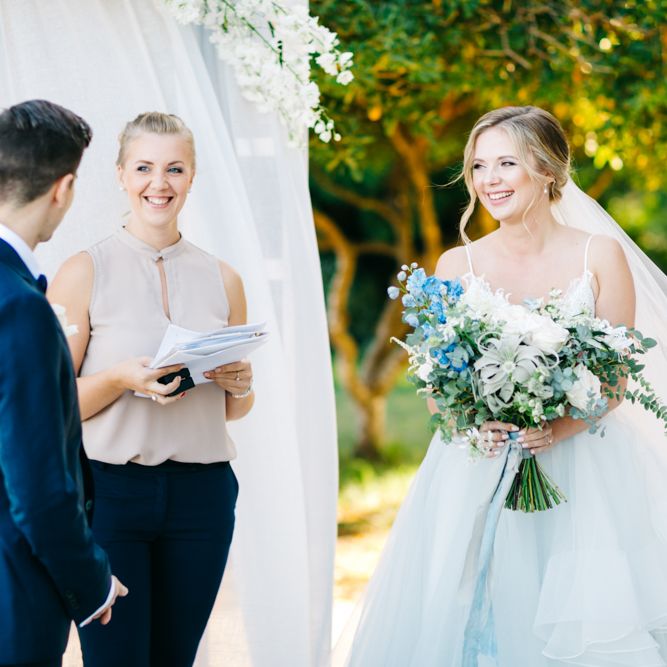 Outdoor Wedding Ceremony | Bride in Coloured Hayley Paige Wedding Dress | Oversized Bouquet | Groom in Navy Blue Tuxedo | Pastel Blue &amp; Green, Romantic, Destination Wedding at Corfu Luxury Villas, Planned by Rosmarin Weddings &amp; Events | Mikhail Balygin Fine Art Wedding Photographer