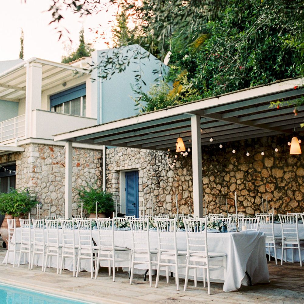 Elegant Tablescape with Coloured Goblets, Floral Table Runner, Taper Candles &amp; Geode Name Place | Pastel Blue &amp; Green, Romantic, Destination Wedding at Corfu Luxury Villas, Planned by Rosmarin Weddings &amp; Events | Mikhail Balygin Fine Art Wedding Photographer