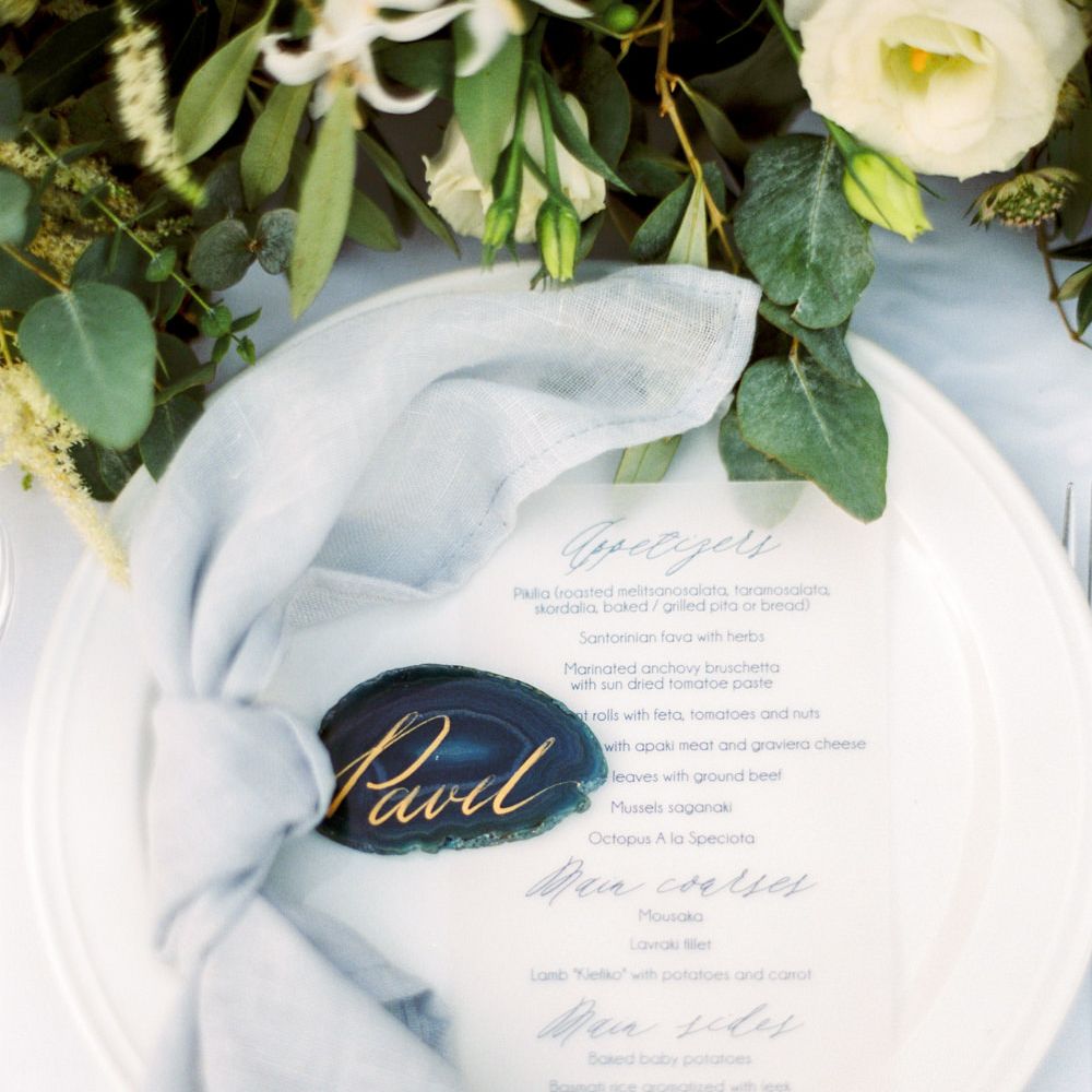 Elegant Place Setting with Coloured Goblet, Floral Table Runner, Taper Candles &amp; Geode Name Place | Pastel Blue &amp; Green, Romantic, Destination Wedding at Corfu Luxury Villas, Planned by Rosmarin Weddings &amp; Events | Mikhail Balygin Fine Art Wedding Photographer