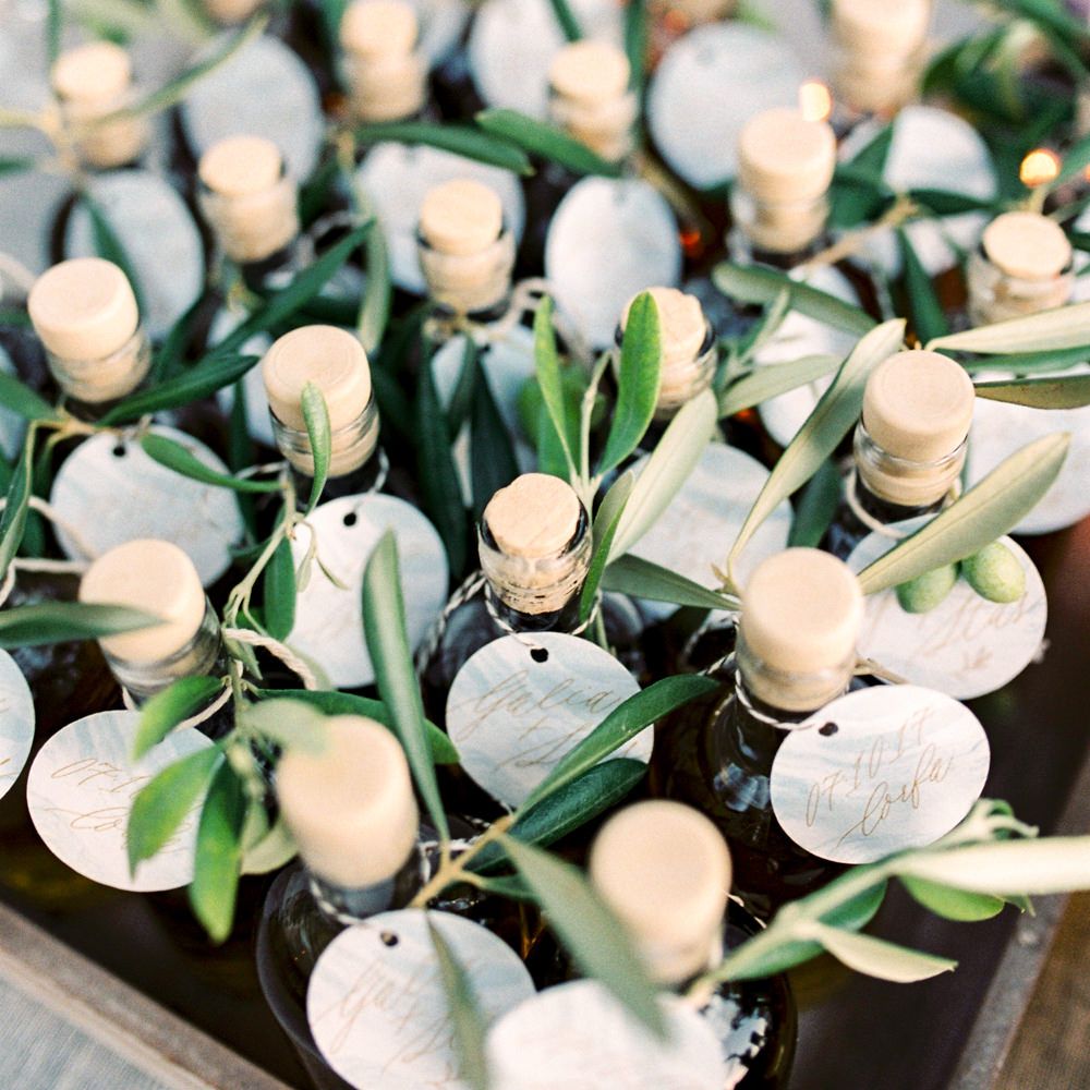 Miniture Olive Oil Wedding Favours | Pastel Blue &amp; Green, Romantic, Destination Wedding at Corfu Luxury Villas, Planned by Rosmarin Weddings &amp; Events | Mikhail Balygin Fine Art Wedding Photographer