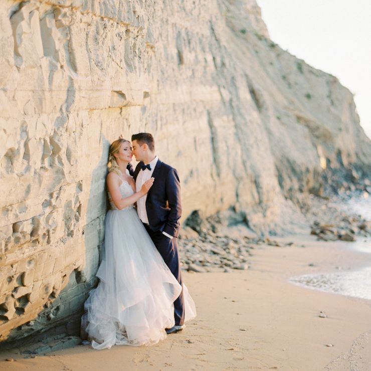 Bride in Coloured Hayley Paige Wedding Dress | Groom in Black Tie Suit | Pastel Blue &amp; Green, Romantic, Destination Wedding at Corfu Luxury Villas, Planned by Rosmarin Weddings &amp; Events | Mikhail Balygin Fine Art Wedding Photographer
