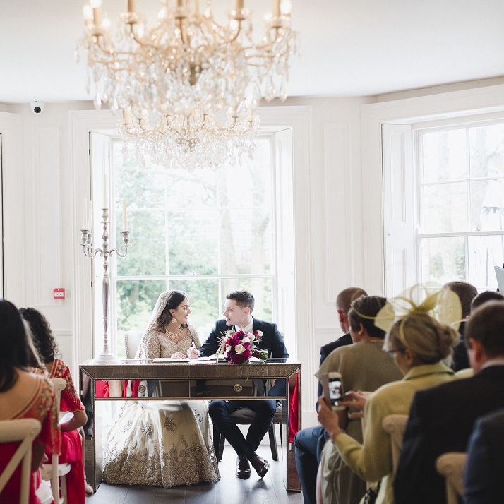 Bride and groom at multicultural wedding ceremony