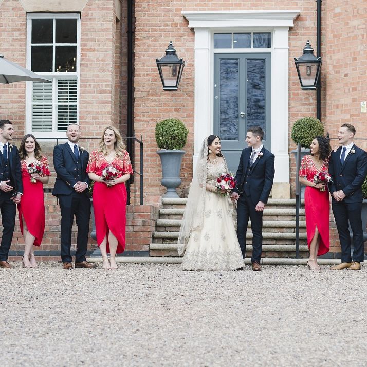 Red bridesmaid dresses for multicultural wedding