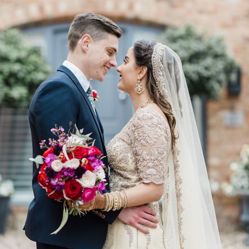 Bride and groom at multicultural wedding