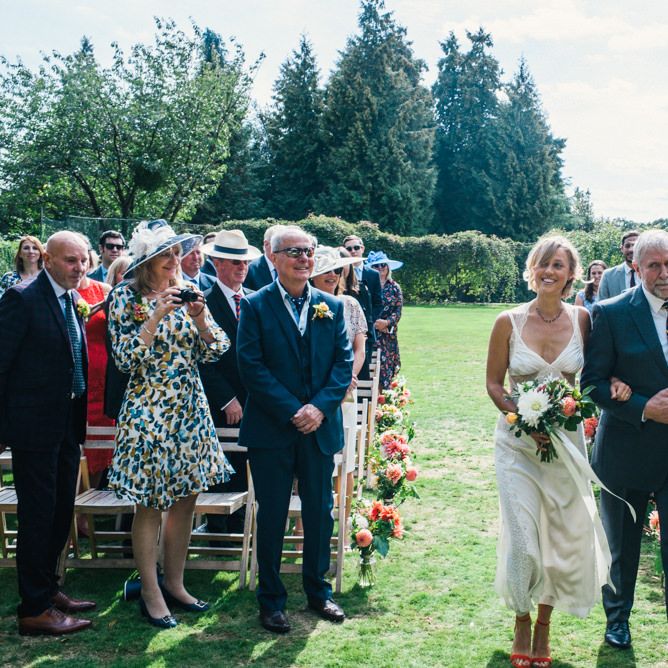 Entrance of the Bride | Bride in Racerback Alexander Wang Wedding Dress | Colourful Pennard House Wedding | Allison Dewey Photography