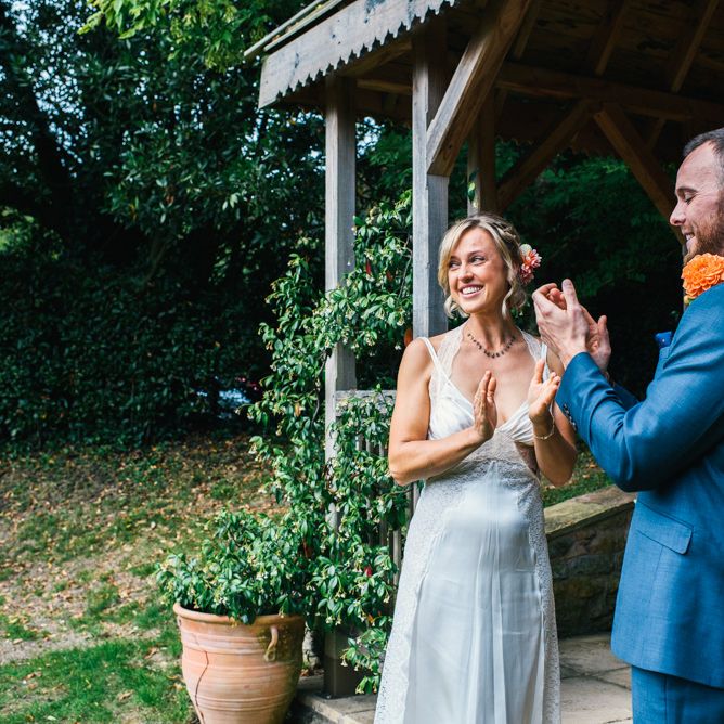 Wedding Ceremony | Bride in Racerback Alexander Wang Wedding Dress | Groom in Blue Ted Baker Suit | Colourful Pennard House Wedding | Allison Dewey Photography