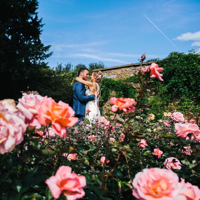 Bride in Racerback Alexander Wang Wedding Dress | Groom in Blue Ted Baker Suit | Colourful Pennard House Wedding With Bride Wearing Racerback Dress | Allison Dewey Photography