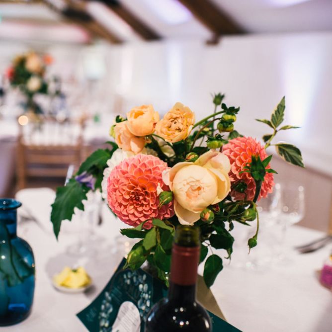 Wedding Reception | Bright Dahlias in Jar | Wedding Breakfast Menu | Colourful Pennard House Wedding With Bride Wearing Racerback Dress | Allison Dewey Photography