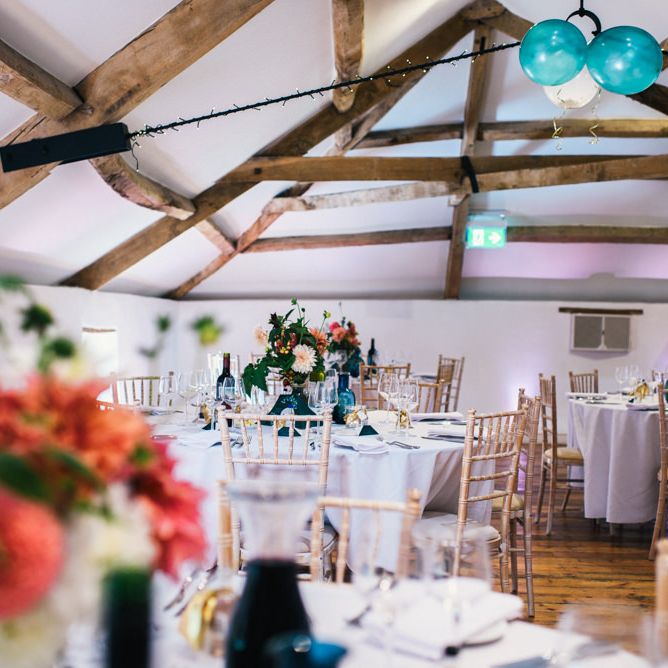 Wedding Reception | Bright Dahlias in Jar | Colourful Pennard House Wedding With Bride Wearing Racerback Dress | Allison Dewey Photography