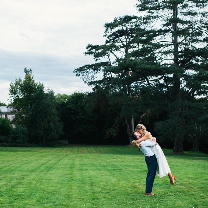 Bride in Racerback Alexander Wang Wedding Dress | Groom in Blue Ted Baker Suit | Colourful Pennard House Wedding With Bride Wearing Racerback Dress | Allison Dewey Photography